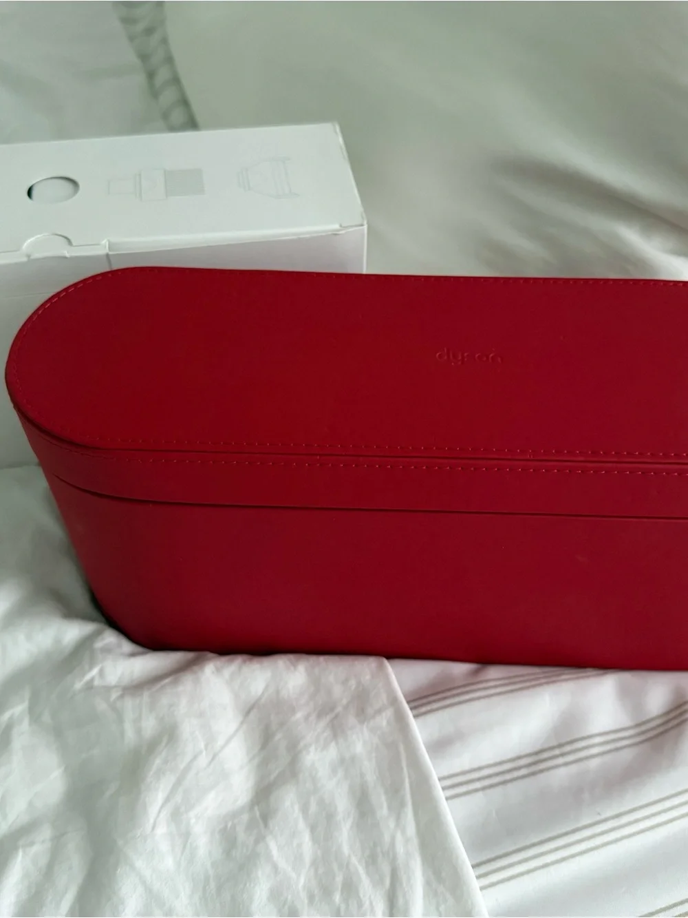 Dyson Hair Dryer with Red and Silver Accessories